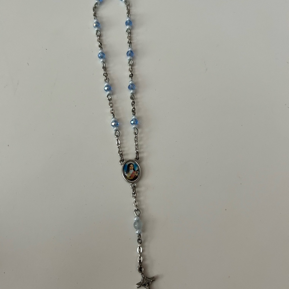4/$100 Silver and Blue Beaded Rosary handheld bracelet